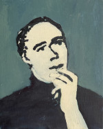 Portrait of a man with his hand to his mouth