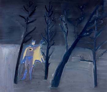 Batman in the woods at night.