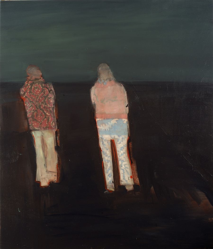 Two figures walking in a field at night.
