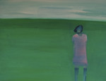 A figure standing on a green lawn