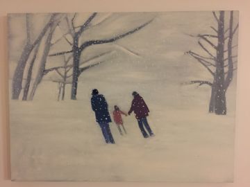 Three figures walking towards trees in the snow.