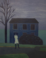 A woman standing on a road outside a blue house