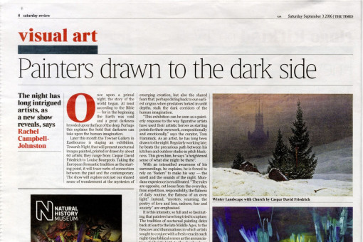 newspaper spread with review of art