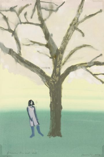 Girl standing beside tree.