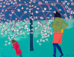 Woman and child standing under blossom tree