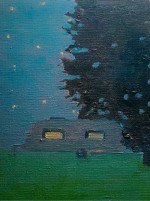 A caravan under the stars next to a tree