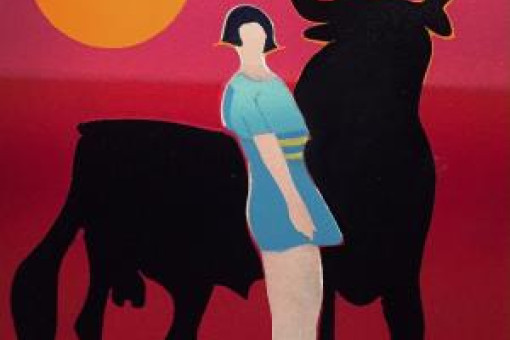 Carmen standing in front of a bull