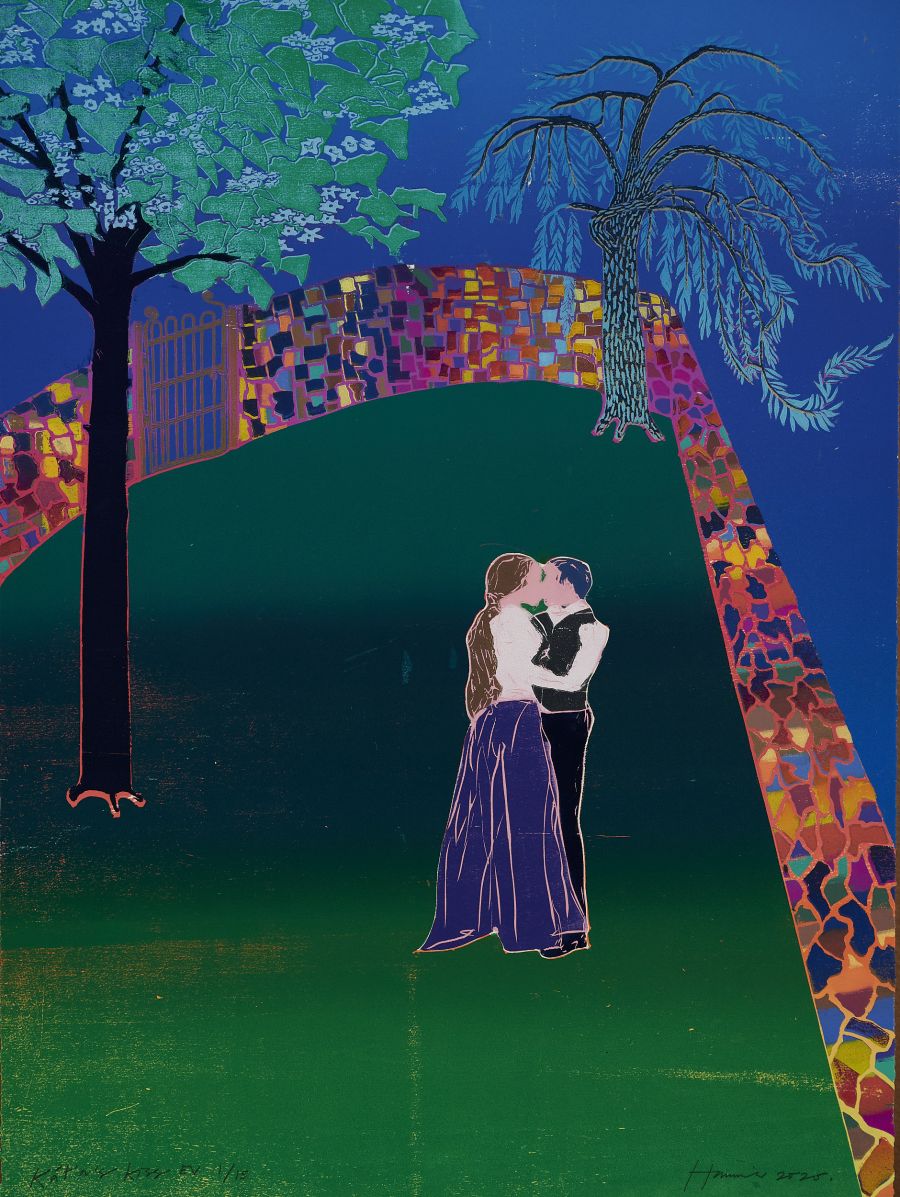 A couple embracing in a walled garden.