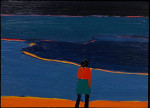 A figure looking out at a blue sea at night